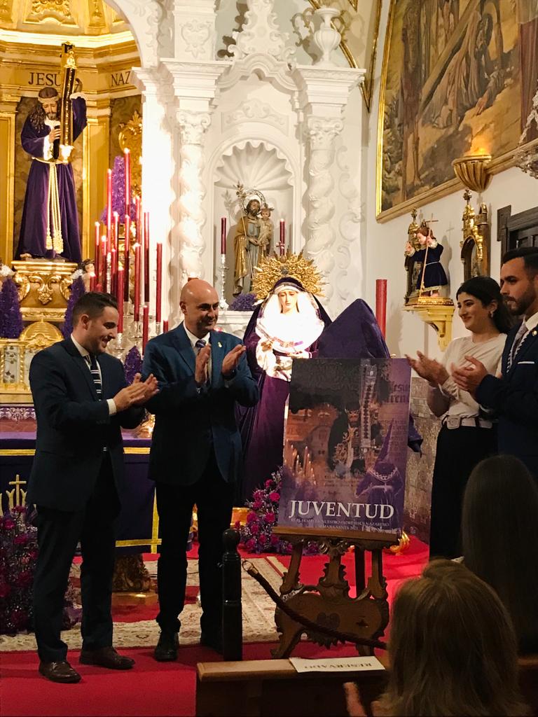 V Cartel de la Juventud: “Ya resuenan en la distancia toques de campana … Todo está preparado … el nazareno vuelve a caminar”